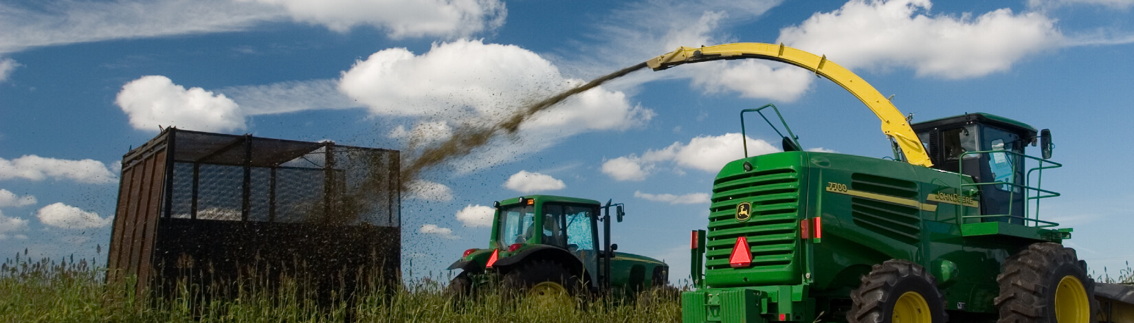 tractor plowing a field for bioenergy crop
